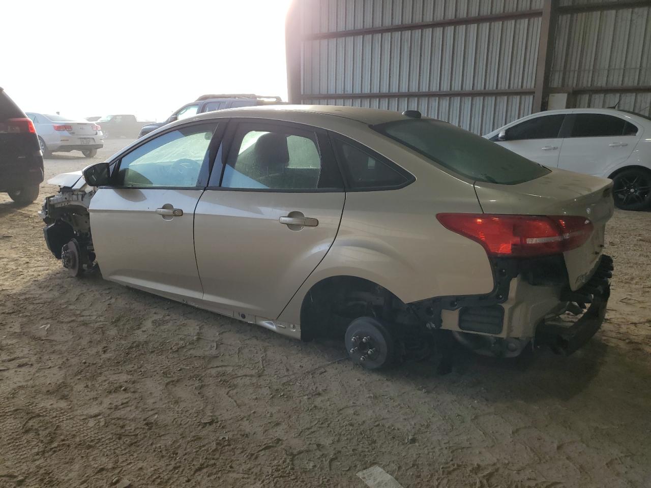 2017 Ford Focus VIN 1FADP3F25HL288492 Copart auction photo, side / stripped damage thumbnail 2