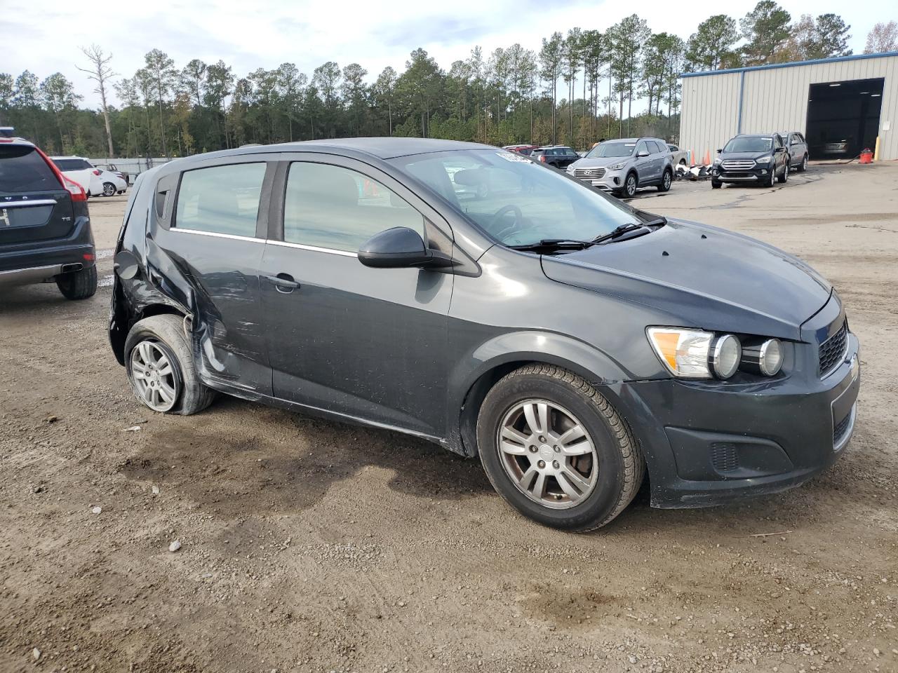2015 Chevrolet Sonic VIN 1G1JC6SG5F4192812 Copart auction photo, side / rear end damage thumbnail 4