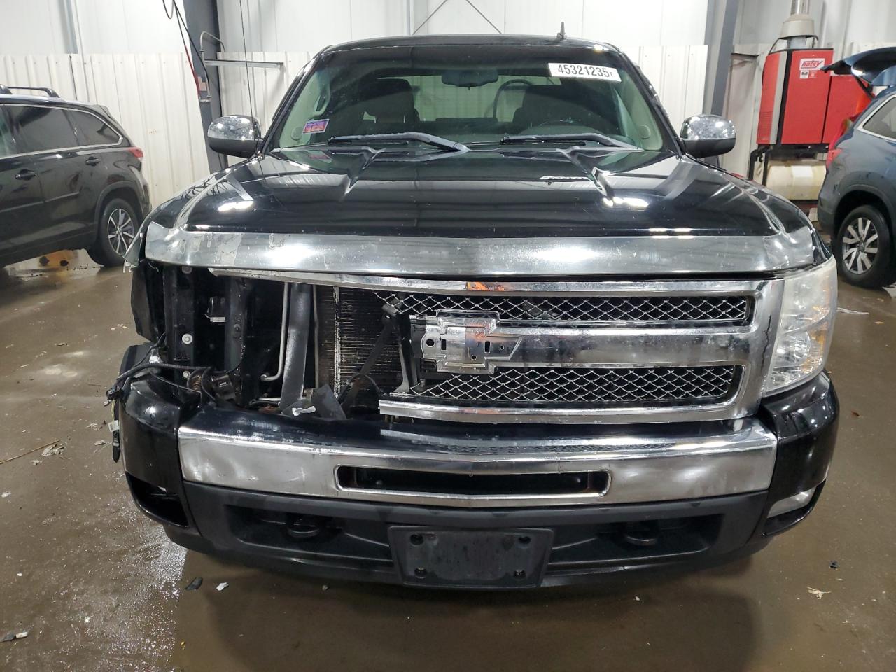 2011 Chevrolet Silverado VIN 1GCRKSE33BZ362774 Copart auction photo, front end / side damage thumbnail 4