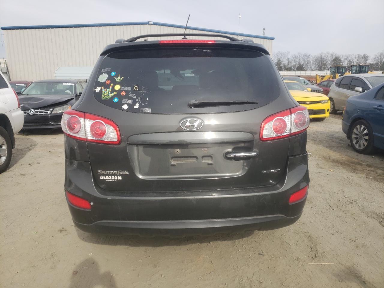 2012 Hyundai Santa Fe VIN 5XYZKDAG8CG095880 Copart auction photo, all over damage thumbnail 6
