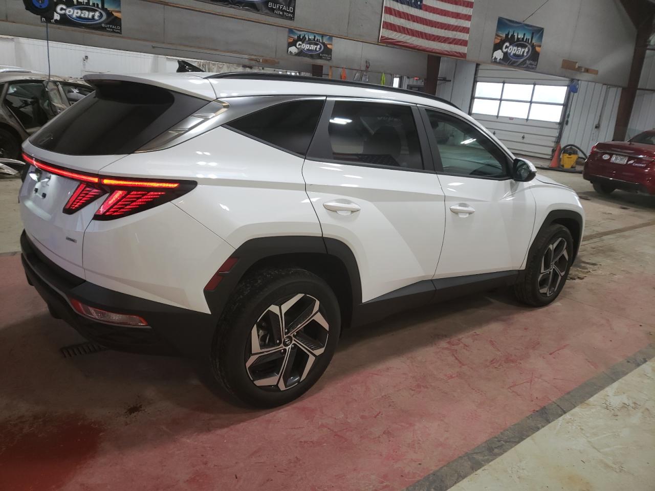 2022 Hyundai Tucson VIN 5NMJFCAE1NH140158 Copart auction photo, side damage thumbnail 3