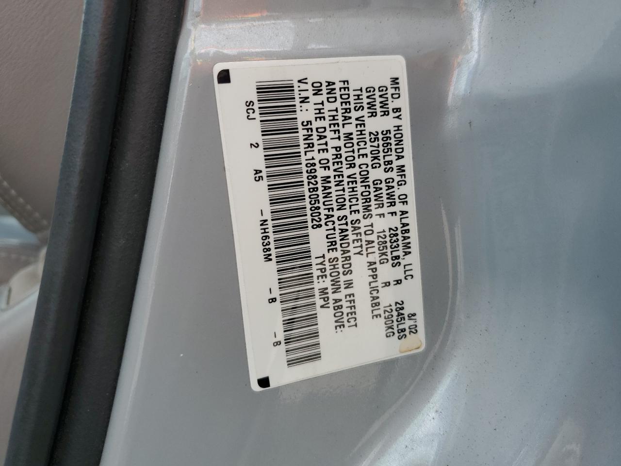 2002 Honda Odyssey VIN 5FNRL18982B058028 Copart auction photo, side / front end damage thumbnail 13