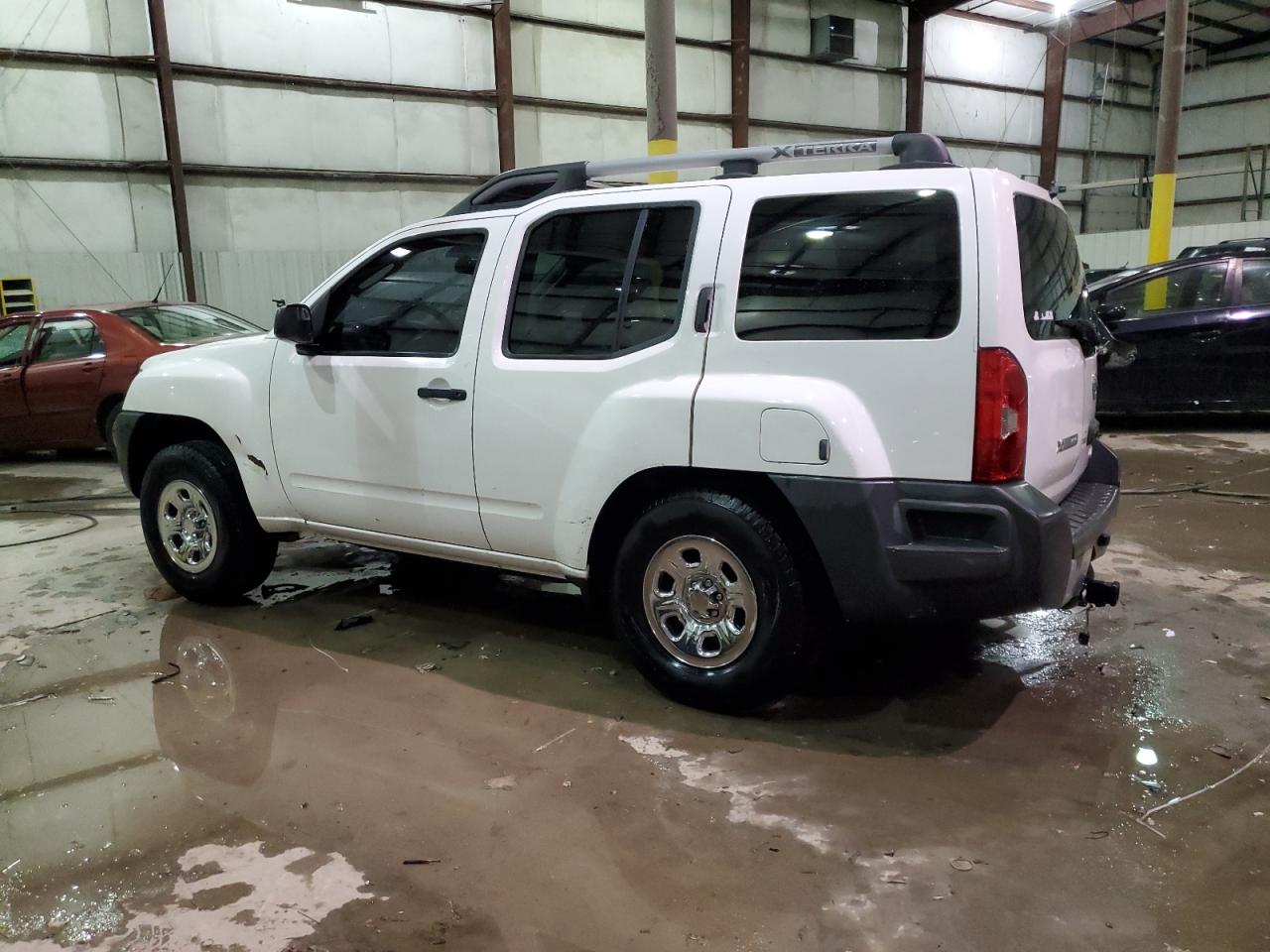2010 Nissan XTerra VIN 5N1AN0NW4AC507448 Copart auction photo, side / front end damage thumbnail 2
