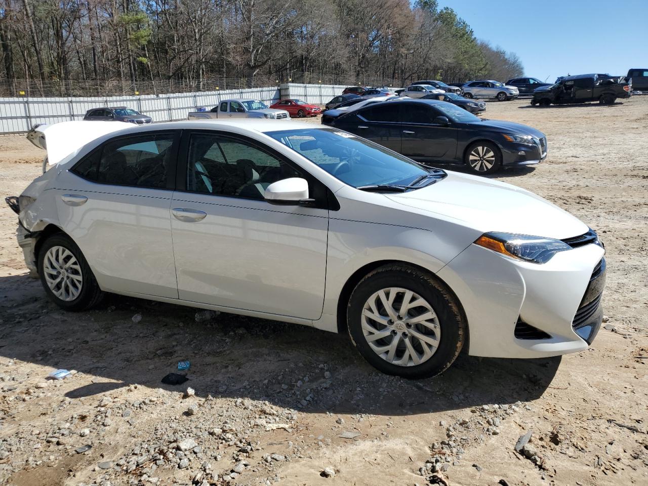 2018 Toyota Corolla VIN 5YFBURHE8JP777745 Copart auction photo, rear end / side damage thumbnail 4