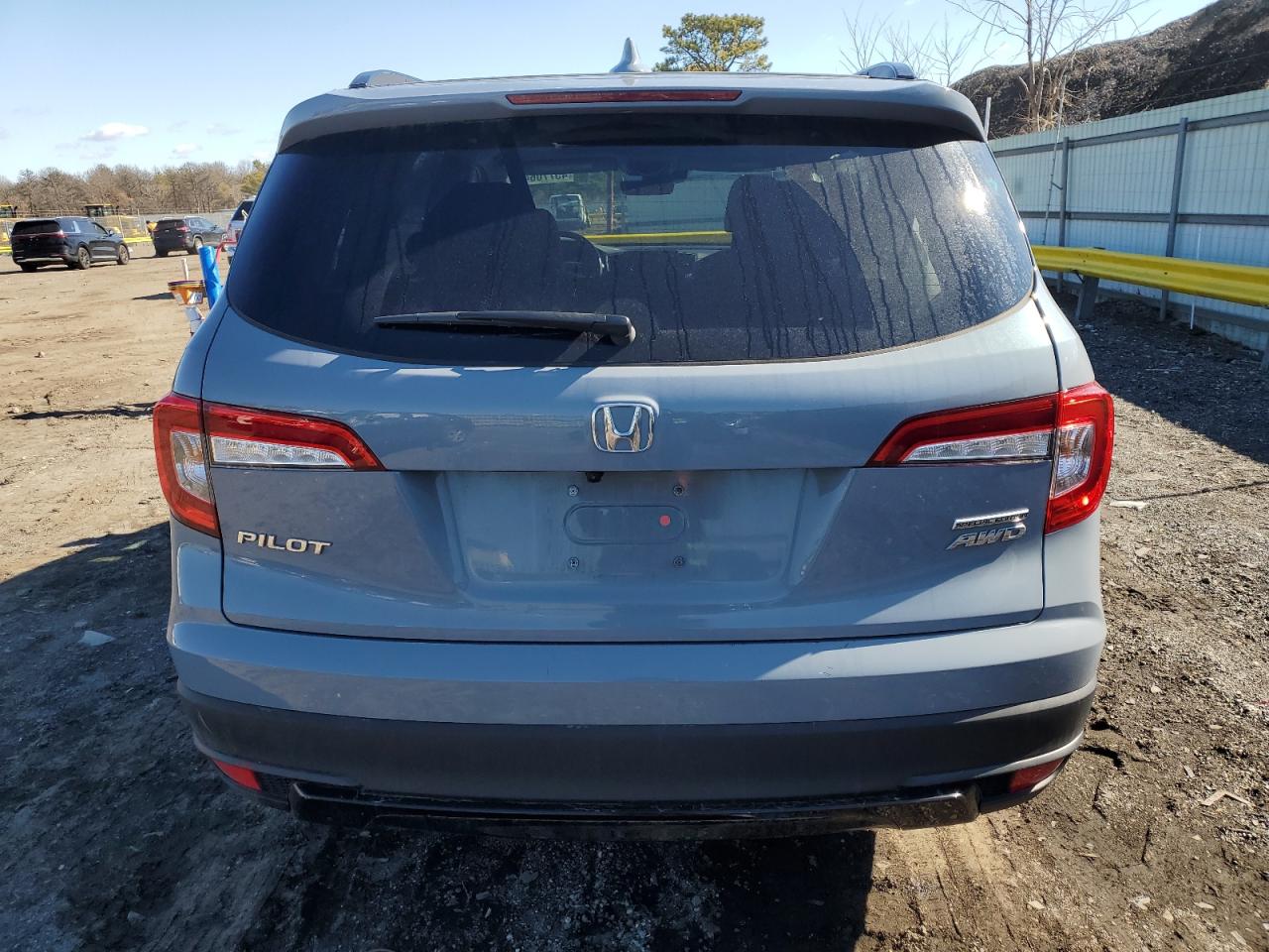 2022 Honda Pilot VIN 5FNYF6H29NB056859 Copart auction photo, side / minor dent/scratches damage thumbnail 6