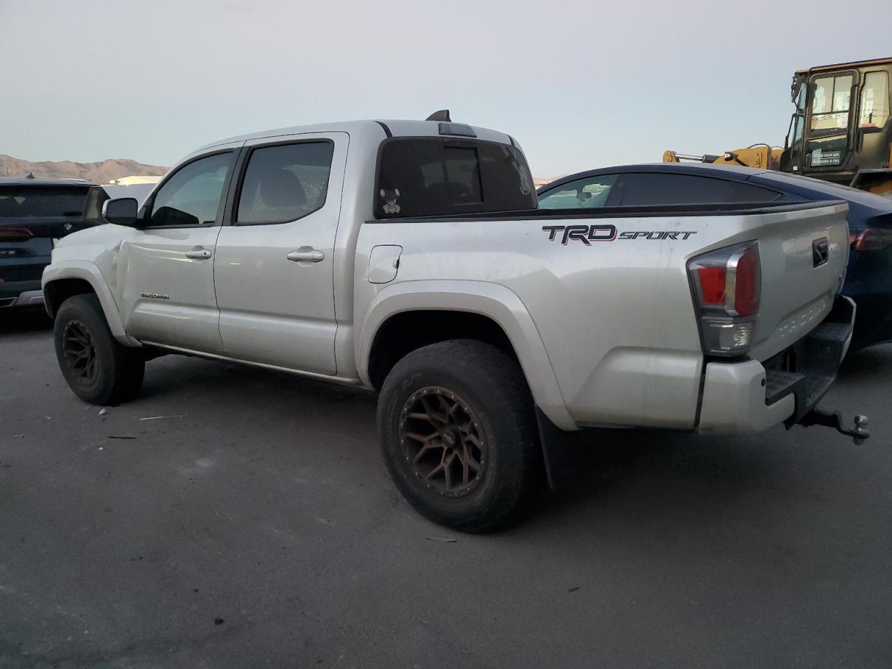 2021 Toyota Tacoma VIN 3TYAZ5CN0MT008377 Copart auction photo, front end / side damage thumbnail 2