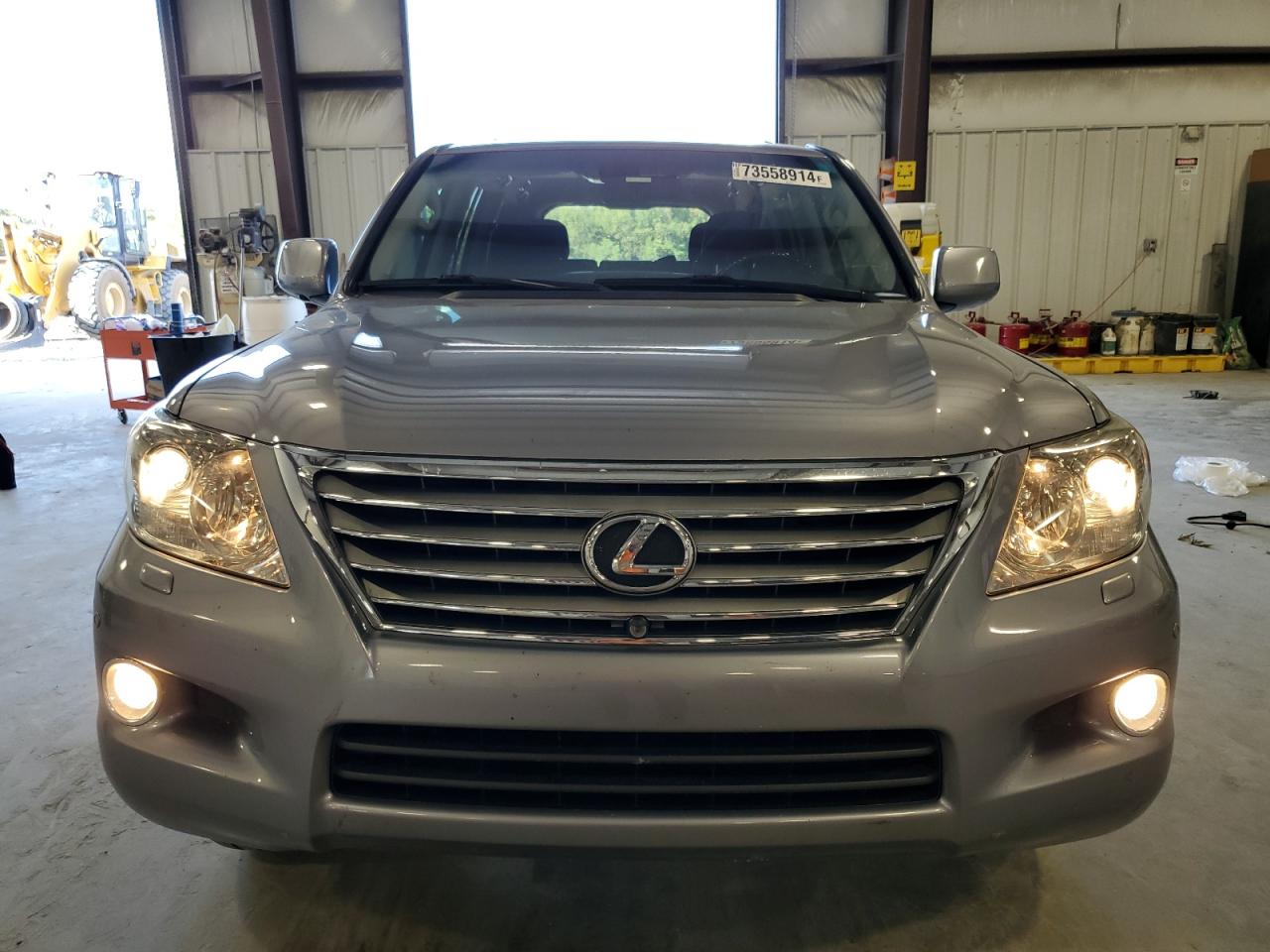 2011 Lexus LX VIN JTJHY7AX2B4071418 Copart auction photo, side / rear end damage thumbnail 5
