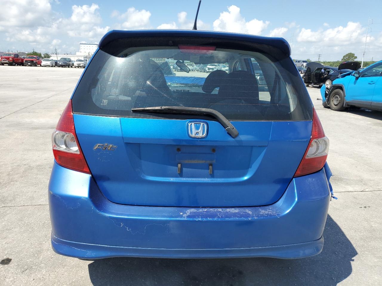 2007 Honda Fit VIN JHMGD38627S010507 Copart auction photo, all over damage thumbnail 6