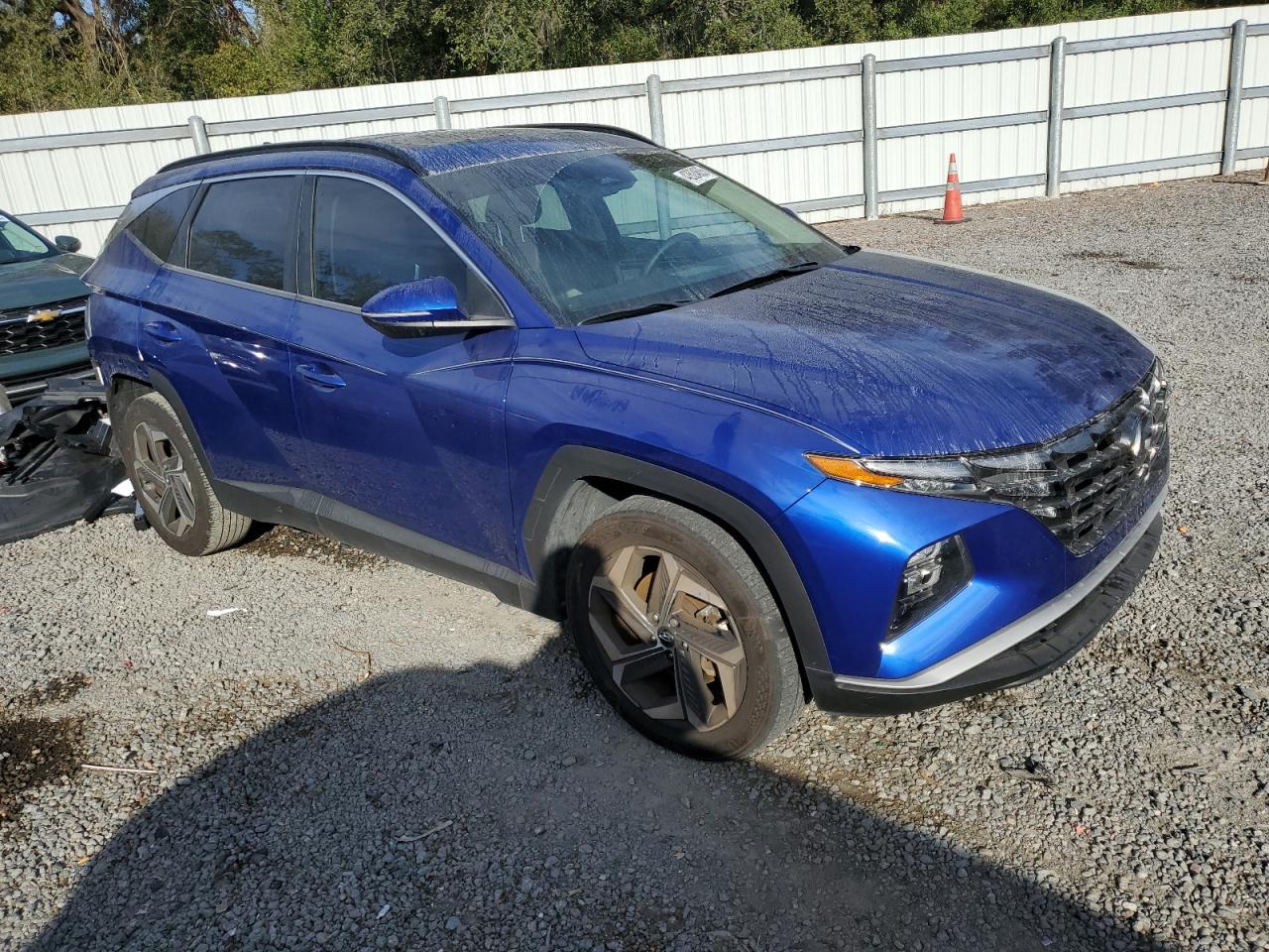 2022 Hyundai Tucson VIN 5NMJC3AE2NH004405 Copart auction photo, rear end damage thumbnail 4