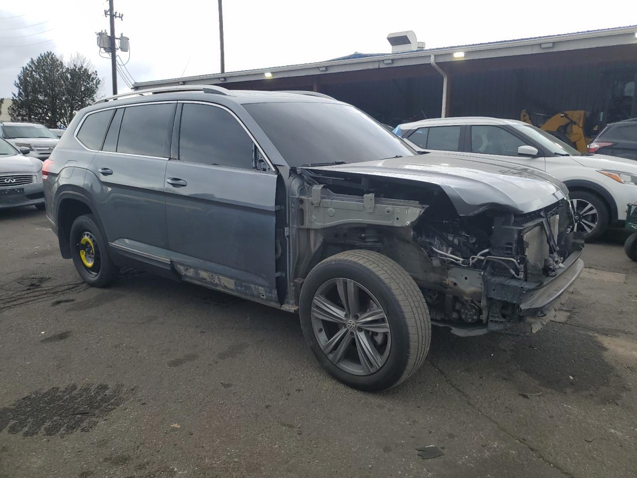 2018 Volkswagen Atlas VIN 1V2NR2CA0JC557128 Copart auction photo, front end / side damage thumbnail 4