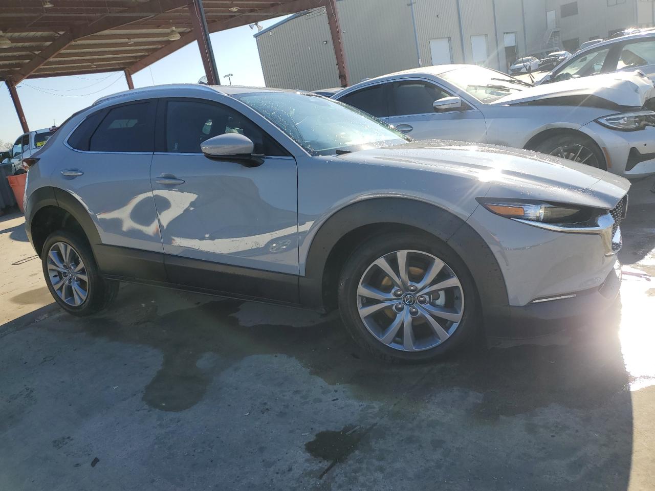 2025 Mazda CX-30 VIN 3MVDMBCM3SM757439 Copart auction photo, undercarriage / hail damage thumbnail 4