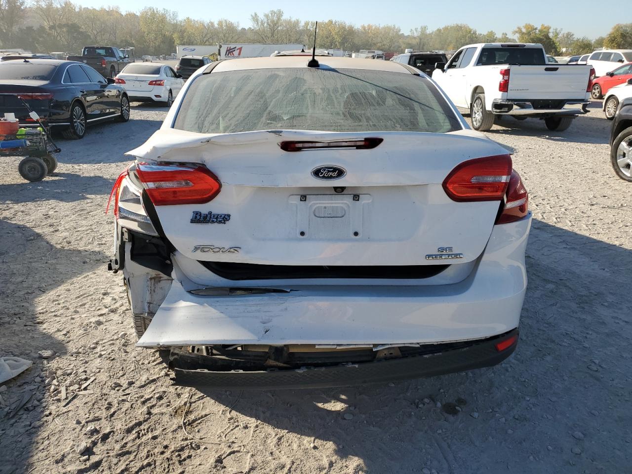 2015 Ford Focus VIN 1FADP3F2XFL351082 Copart auction photo, hail / rear end damage thumbnail 6