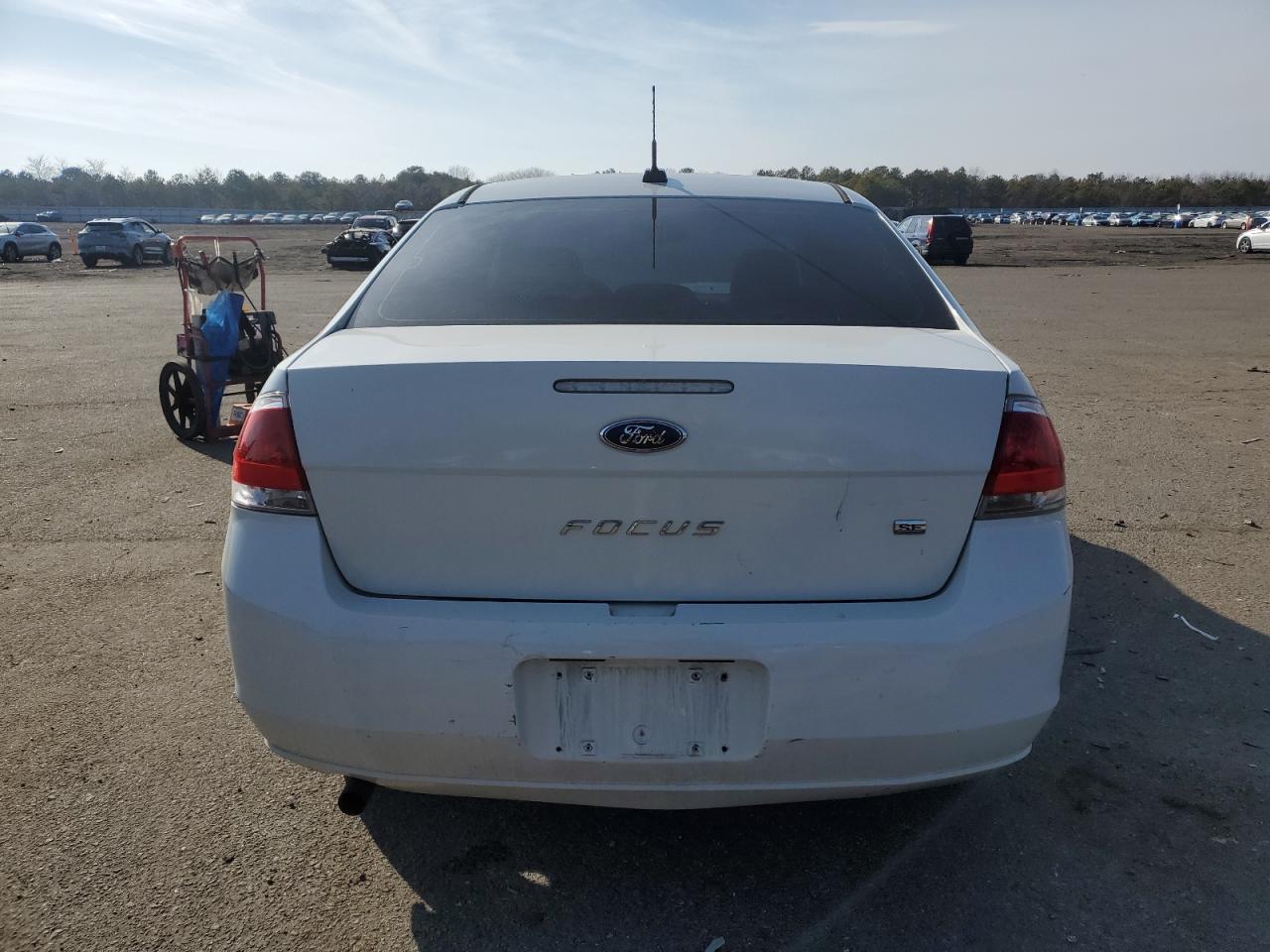 2010 Ford Focus VIN 1FAHP3FN7AW127688 Copart auction photo, front end / undercarriage damage thumbnail 6