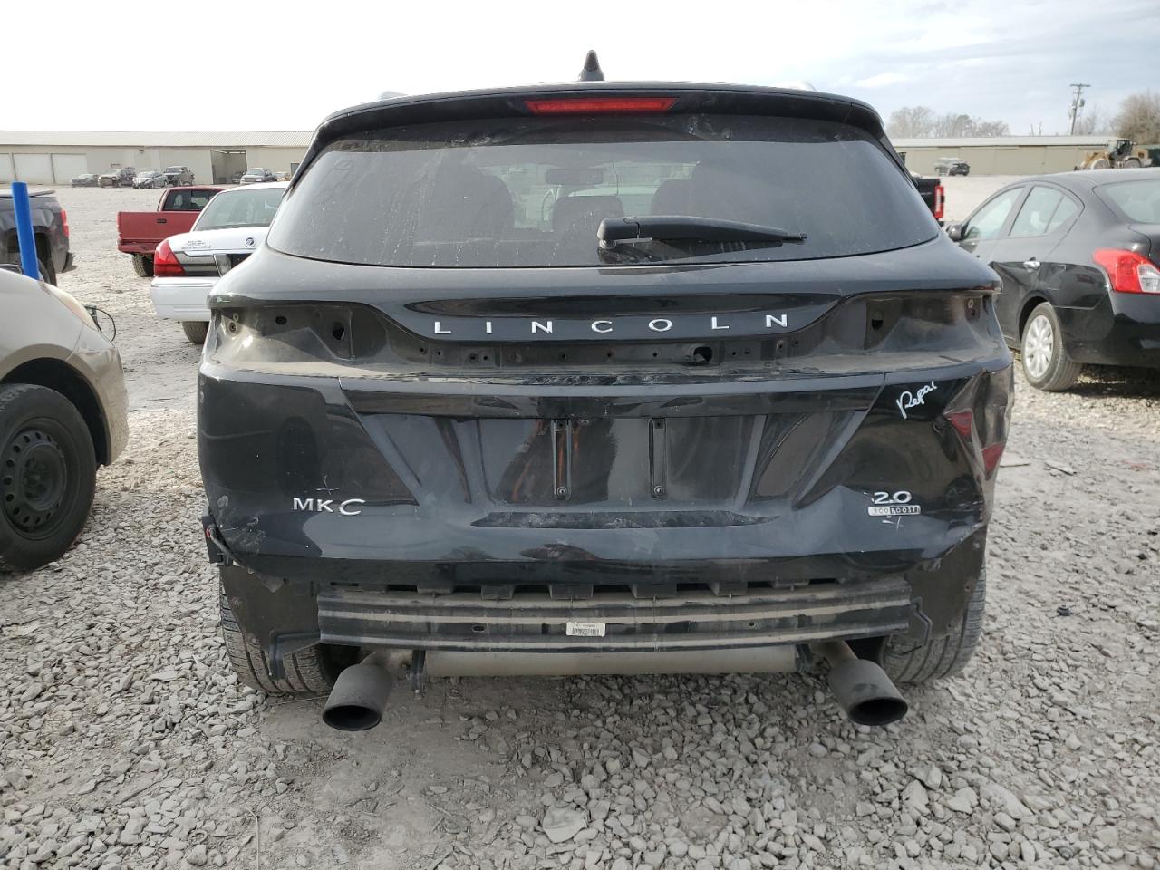 2015 Lincoln MKZ VIN 5LMCJ1A91FUJ22664 Copart auction photo, rear end / minor dent/scratches damage thumbnail 6