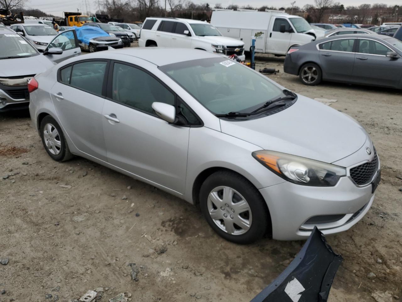 2016 KIA Forte VIN KNAFX4A64G5498990 Copart auction photo, vandalism damage thumbnail 4