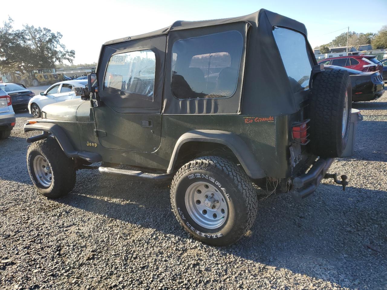 1995 Jeep Wrangler VIN 1J4FY19P1SP256905 Copart auction photo, water/flood damage thumbnail 2