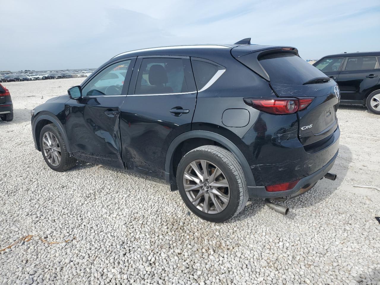 2019 Mazda CX-5 VIN JM3KFADM5K1542046 Copart auction photo, side damage thumbnail 2