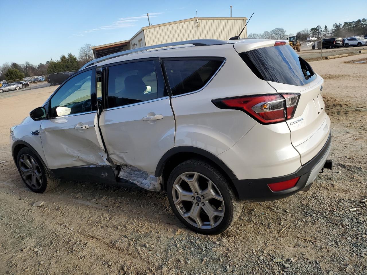 2017 Ford Escape VIN 1FMCU0J94HUC18036 Copart auction photo, side damage thumbnail 2