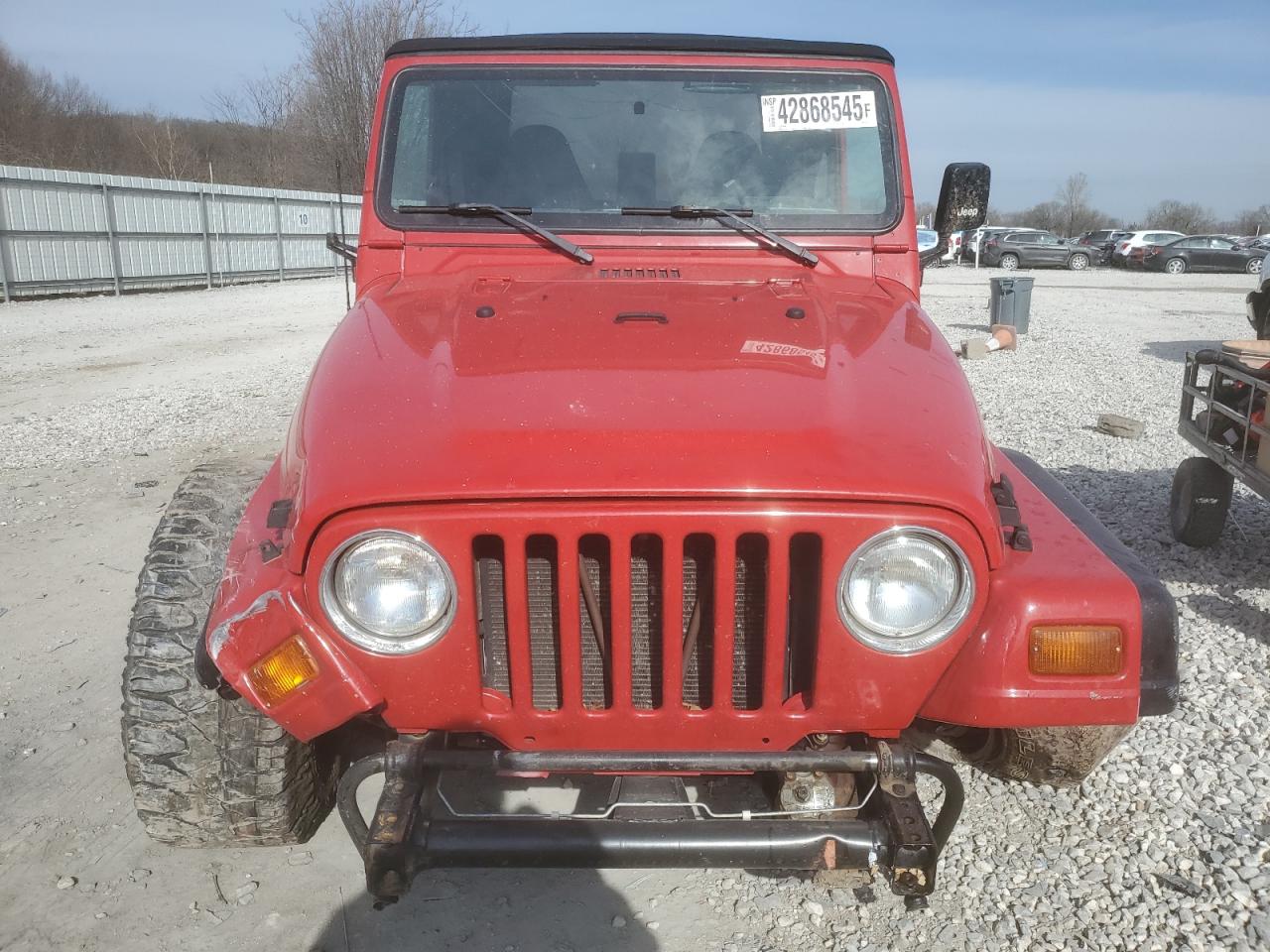 1999 Jeep Wrangler VIN 1J4FY19S6XP402517 Copart auction photo, front end / undercarriage damage thumbnail 5