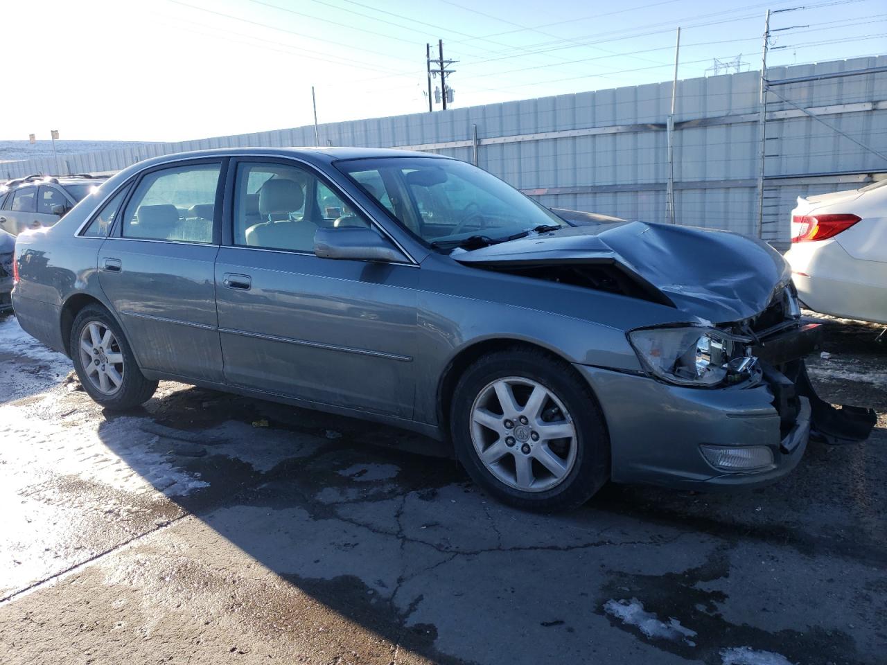2000 Toyota Avalon VIN 4T1BF28B2YU070382 Copart auction photo, front end / hail damage thumbnail 4