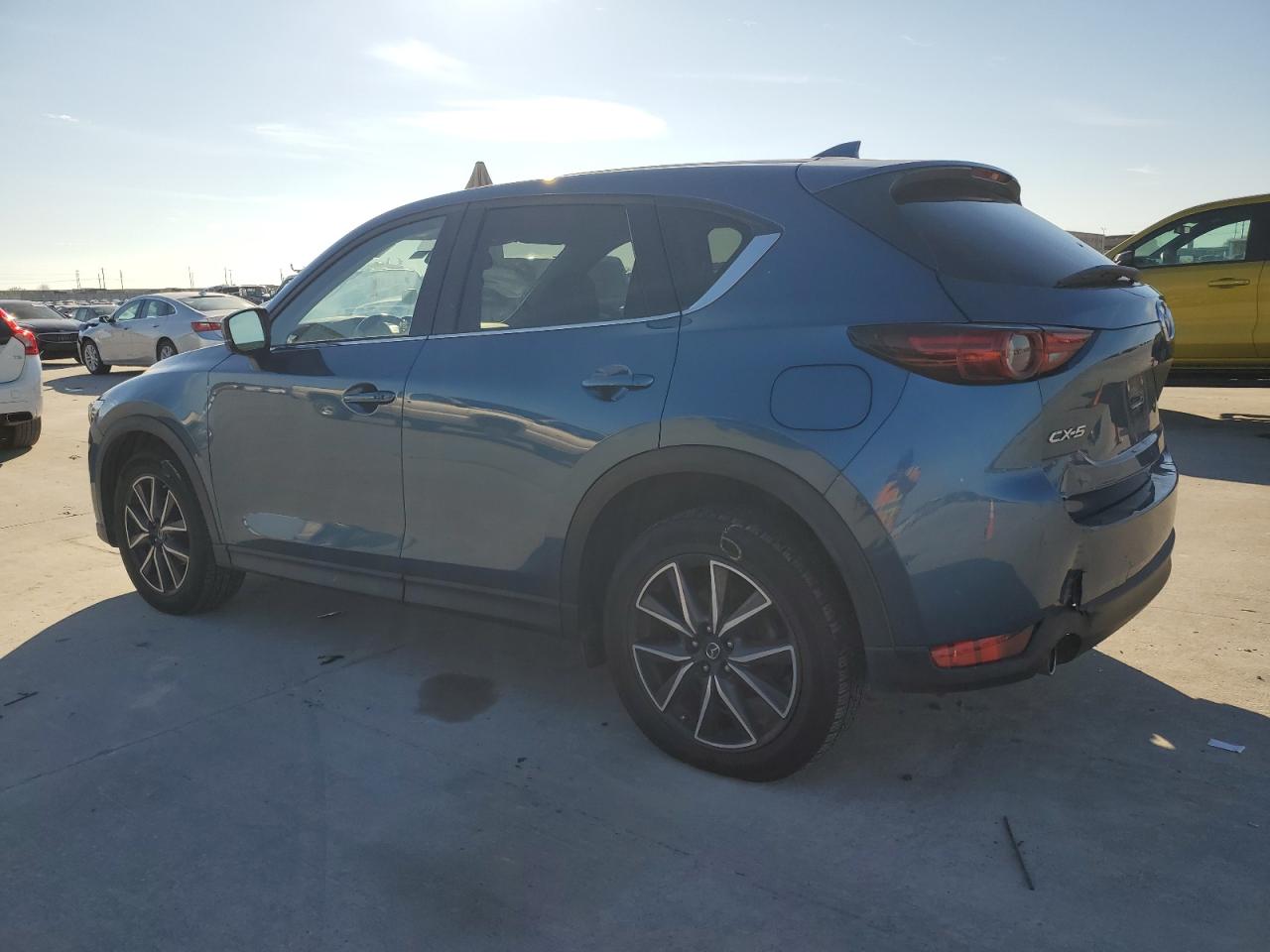 2018 Mazda CX-5 VIN JM3KFADM2J0405621 Copart auction photo, side / front end damage thumbnail 2
