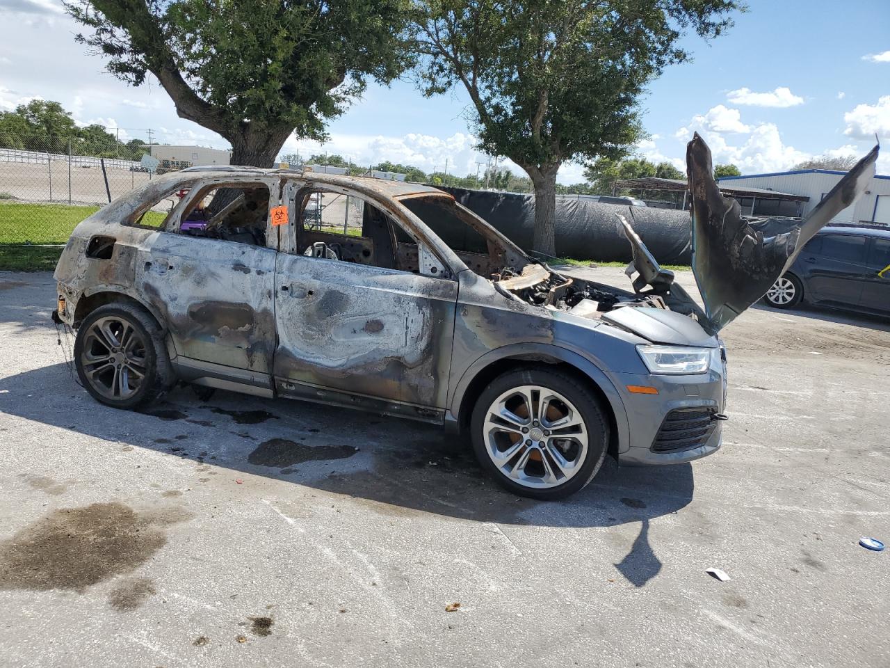 2016 Audi Q3 VIN WA1GFCFS4GR024437 Copart auction photo, burn damage thumbnail 4