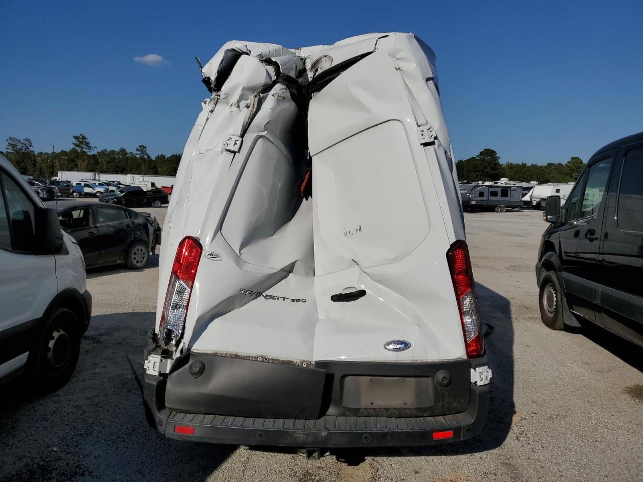 2021 Ford Transit VIN 1FTBW3X83MKA40734 Copart auction photo, rear end damage thumbnail 6