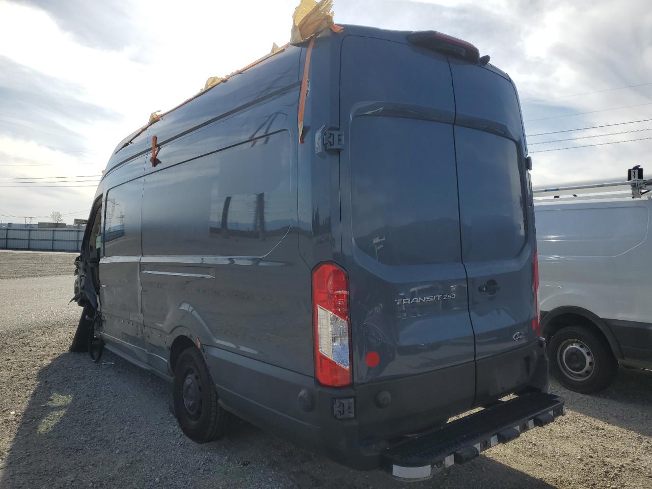 2021 Ford Transit VIN 1FTBR3X81MKA46507 Copart auction photo, all over damage thumbnail 2