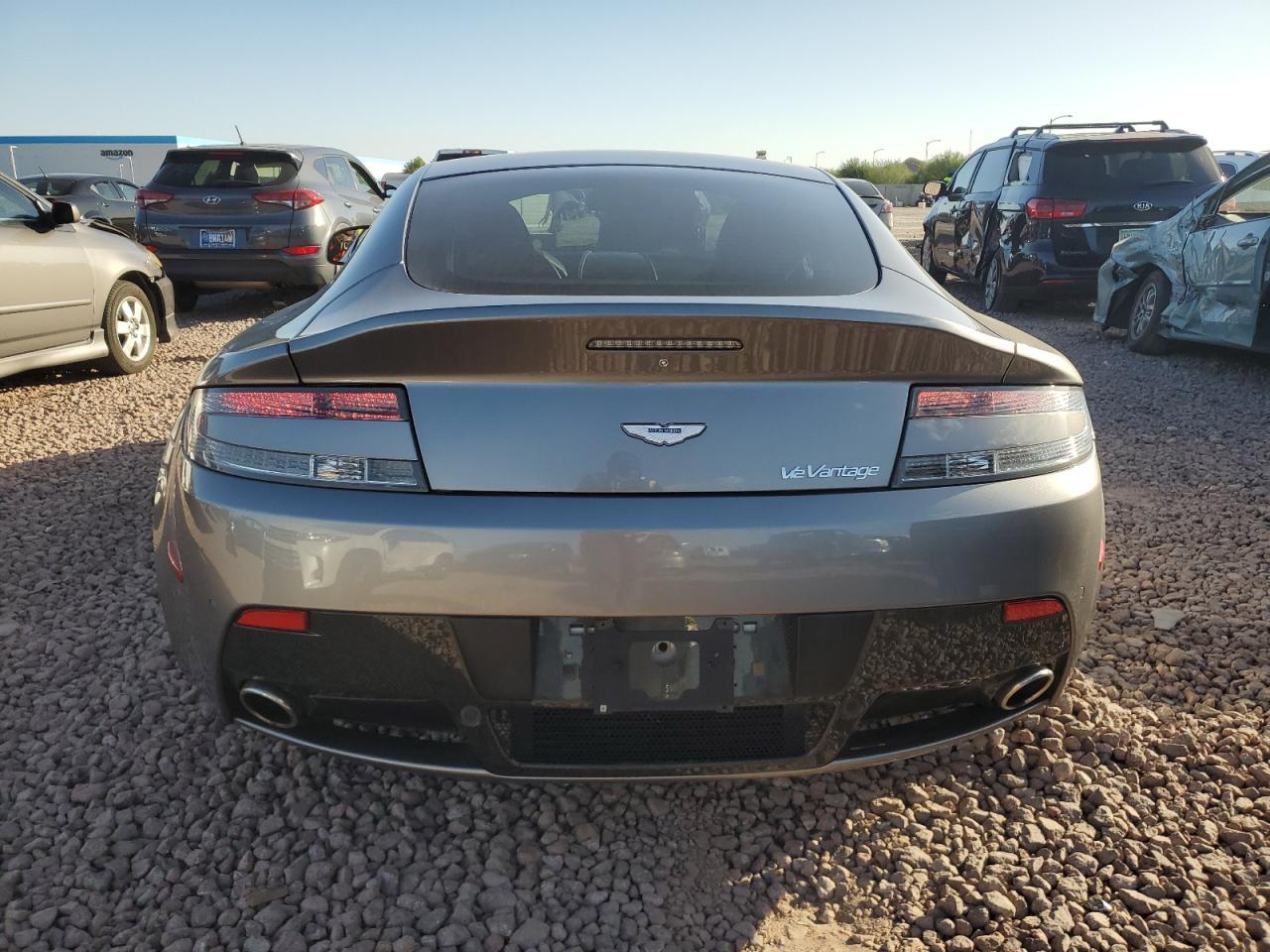 2011 Aston Martin Vantage VIN SCFEBBCF4BGS00791 Copart auction photo, minor dent/scratches damage thumbnail 6