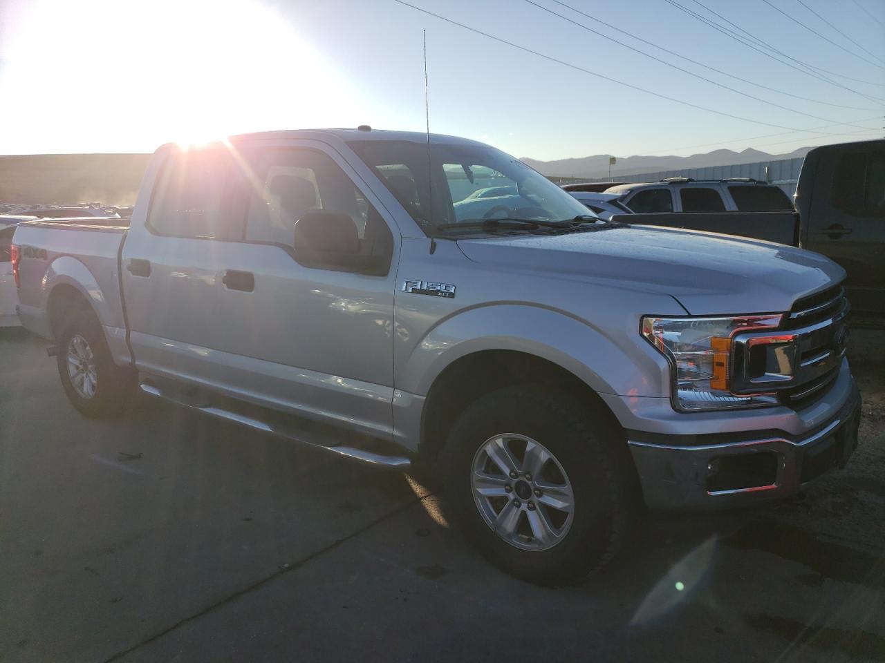 2018 Ford F-150 VIN 1FTEW1EB5JKE94186 Copart auction photo, hail / minor dent/scratches damage thumbnail 4