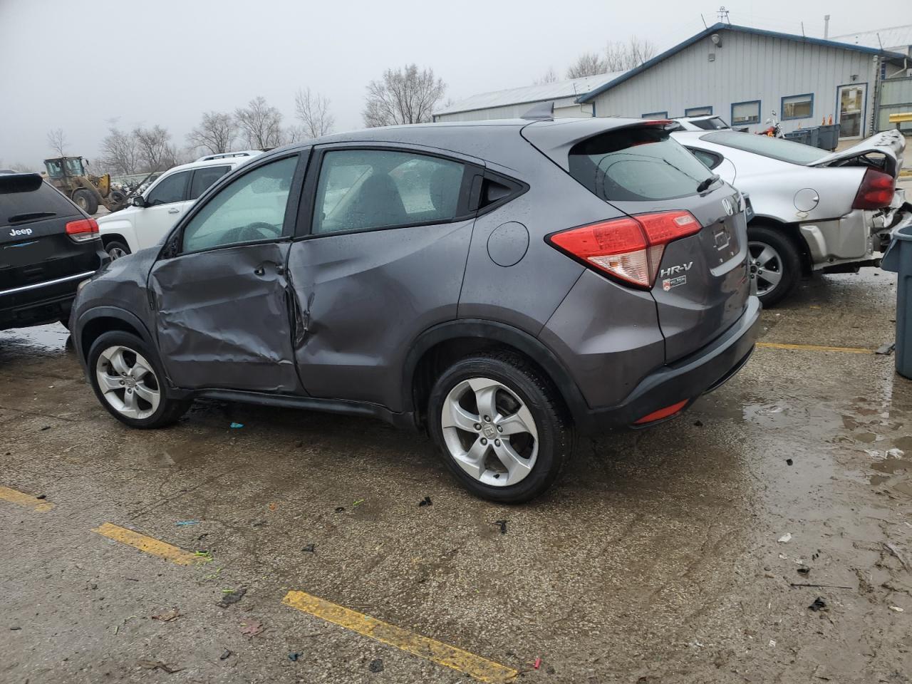 2016 Honda HR-V VIN 3CZRU6H33GM742634 Copart auction photo, side / front end damage thumbnail 2