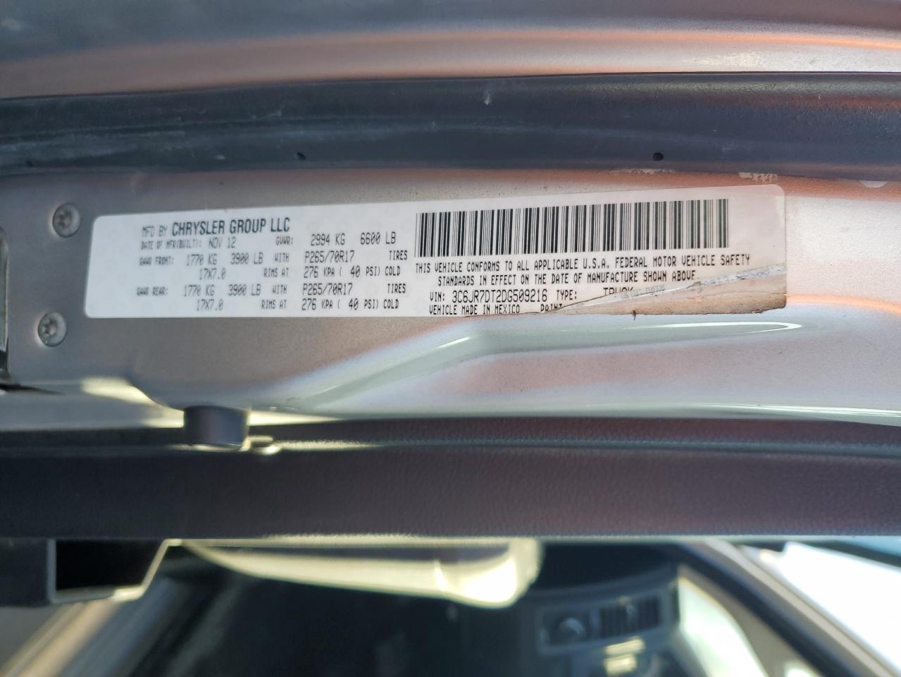 2013 RAM 1500 VIN 3C6JR7DT2DG509216 Copart auction photo, front end / minor dent/scratches damage thumbnail 12