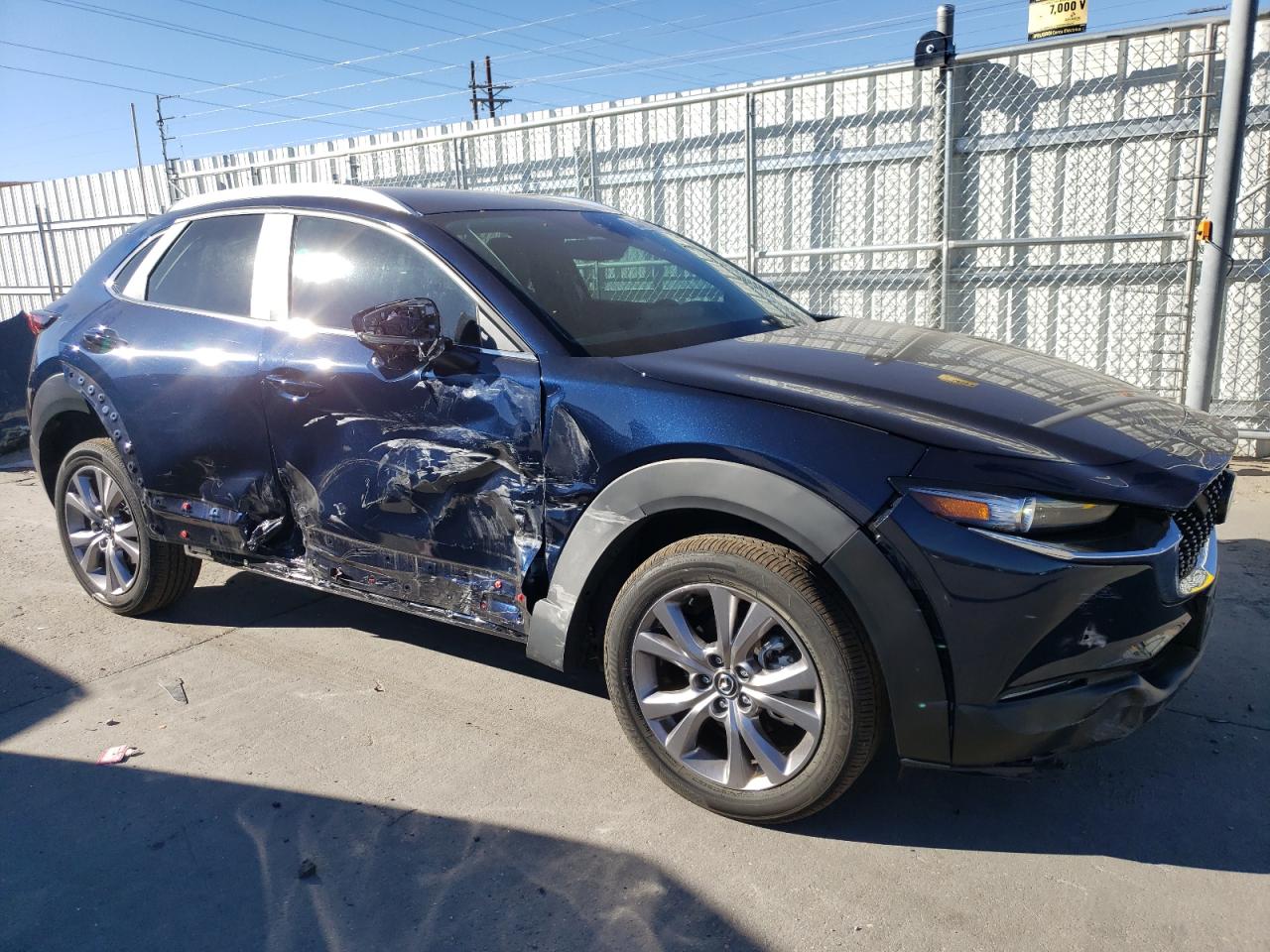 2023 Mazda CX-30 VIN 3MVDMBCM9PM513897 Copart auction photo, side / front end damage thumbnail 4