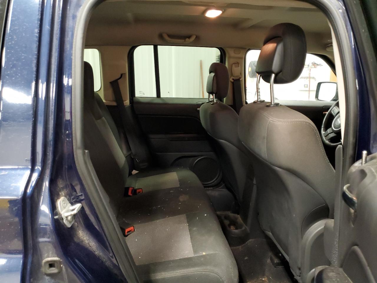 2012 Jeep Liberty (Patriot) VIN 1C4NJRFBXCD599647 Copart auction photo, front end damage thumbnail 11