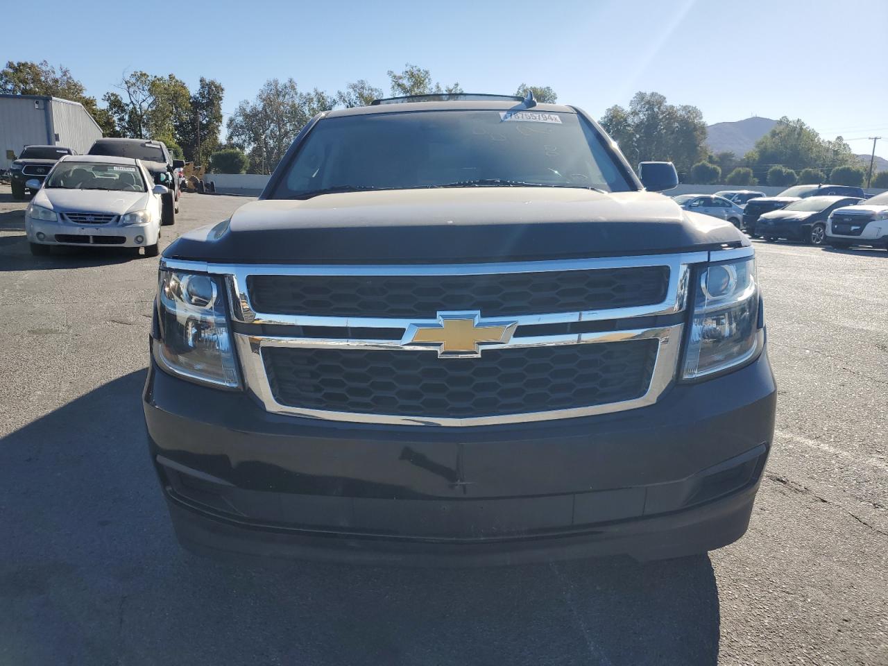 2016 Chevrolet Suburban VIN 1GNSCHKCXGR144321 Copart auction photo, all over damage thumbnail 5