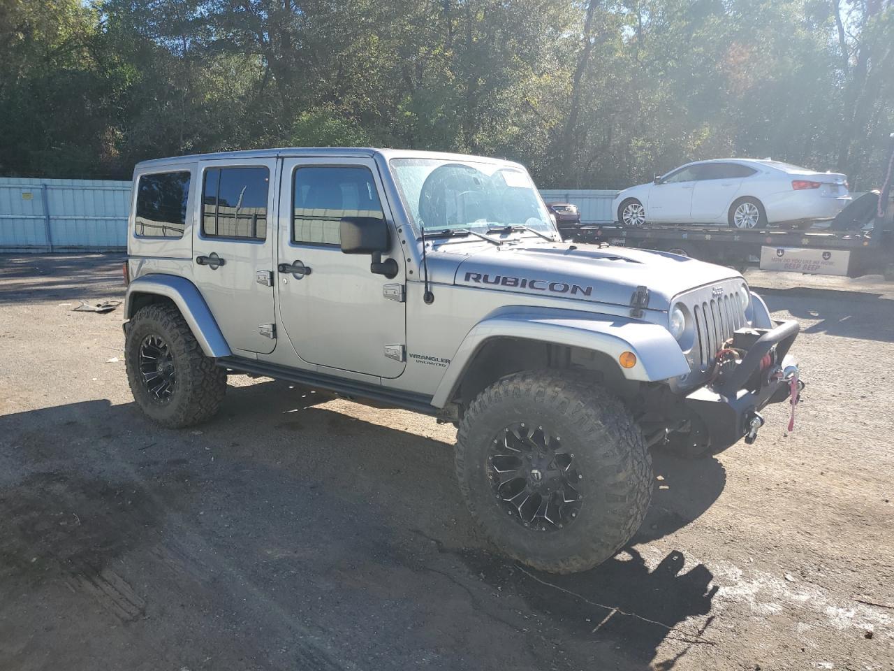 2016 Jeep Wrangler VIN 1C4BJWFG7GL290811 Copart auction photo, rear end / minor dent/scratches damage thumbnail 4