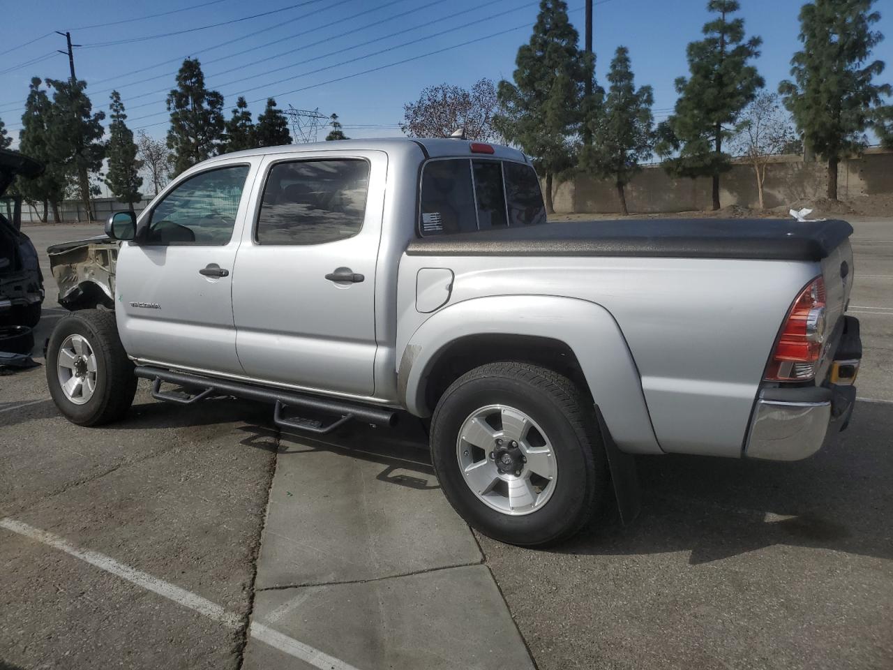 2012 Toyota Tacoma VIN 5TFJX4GN5CX010690 Copart auction photo, front end / side damage thumbnail 2