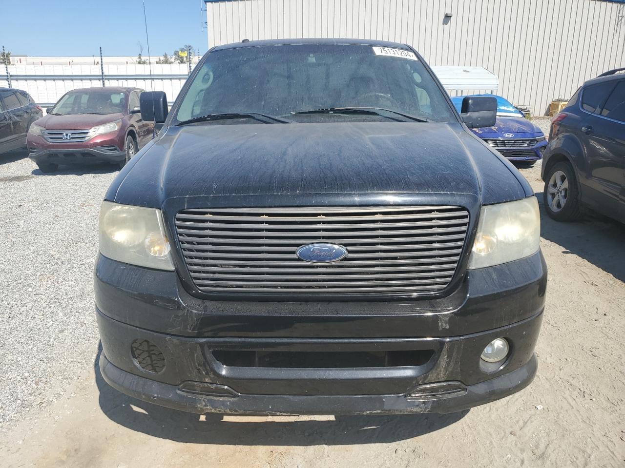 2007 Ford F-150 VIN 1FTPX12V57NA61219 Copart auction photo, water/flood damage thumbnail 5