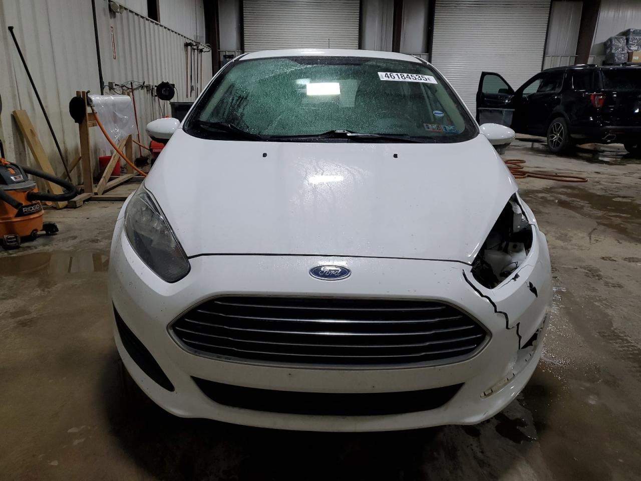 2015 Ford Fiesta VIN 3FADP4EJ8FM130626 Copart auction photo, front end / side damage thumbnail 5