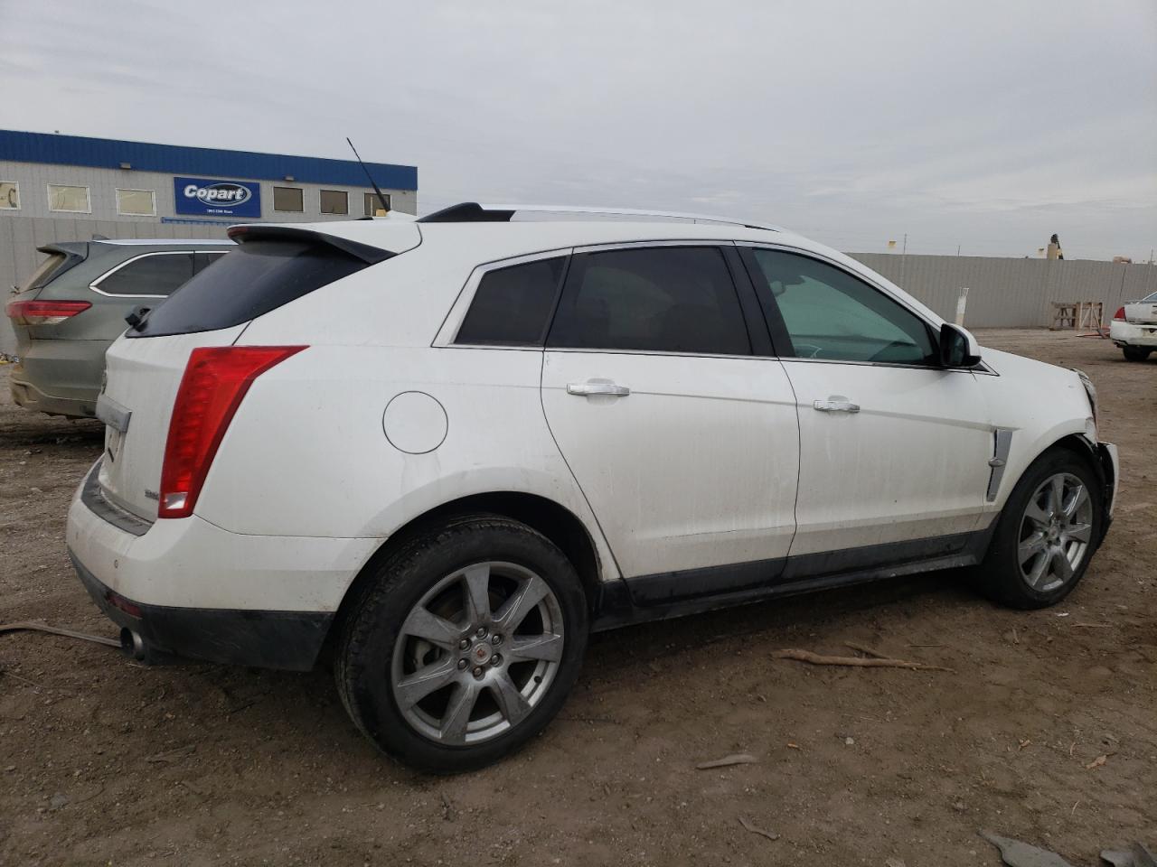 2012 Cadillac SRX VIN 3GYFNEE35CS561149 Copart auction photo, front end / rear end damage thumbnail 3