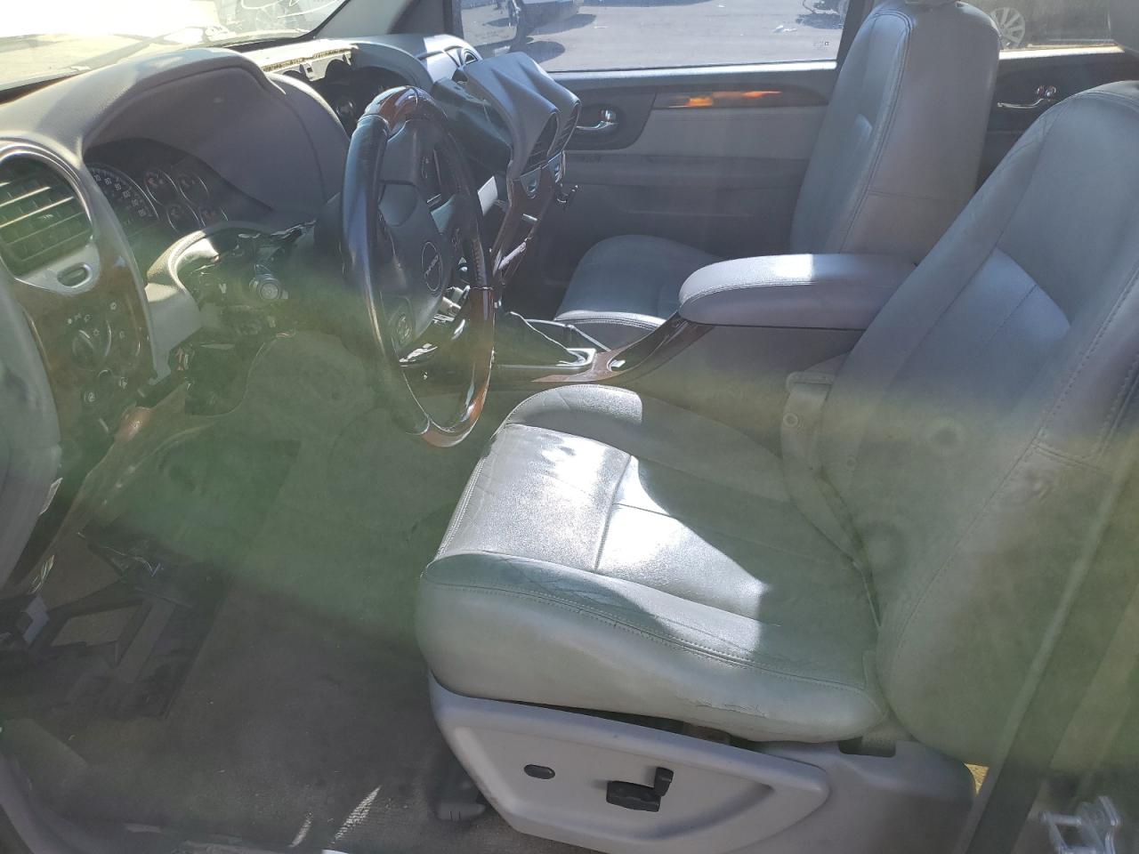 2006 GMC Envoy VIN 1GKES66M866131233 Copart auction photo, all over / undercarriage damage thumbnail 7