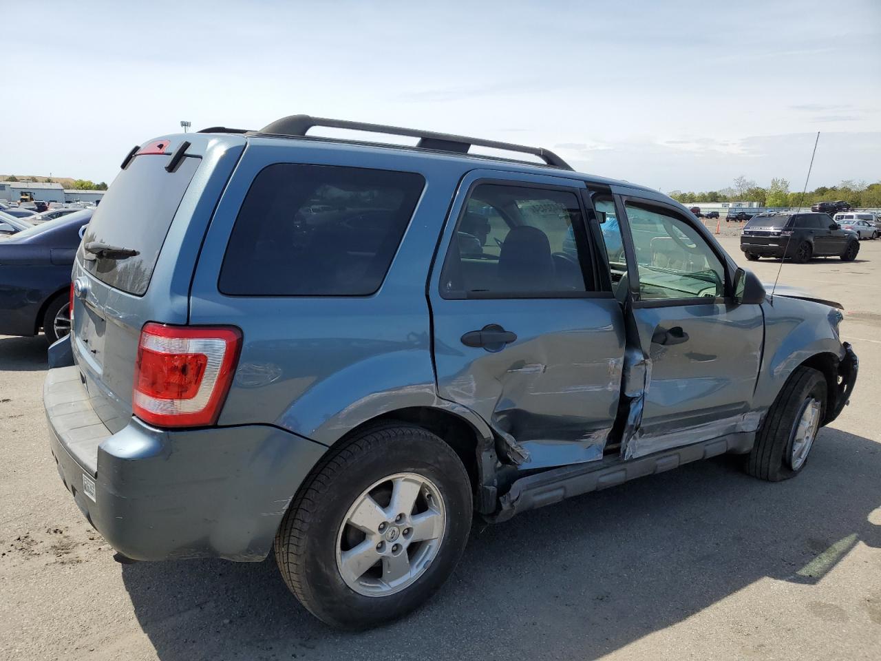 2011 Ford Escape VIN 1FMCU0D79BKC21138 Copart auction photo, all over damage thumbnail 3