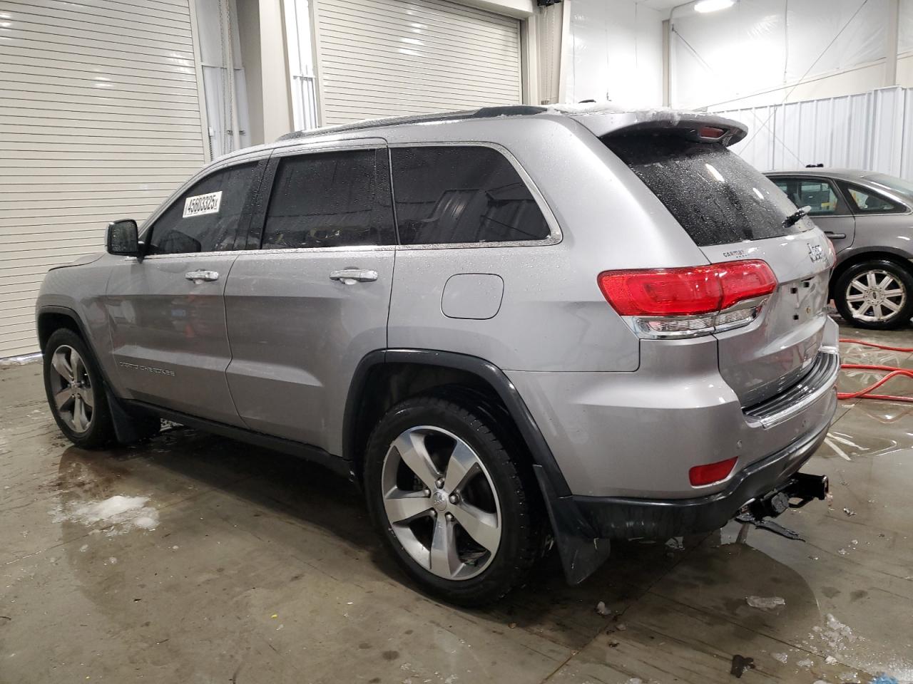 2016 Jeep Grand Cherokee VIN 1C4RJEBG7GC339519 Copart auction photo, side damage thumbnail 2