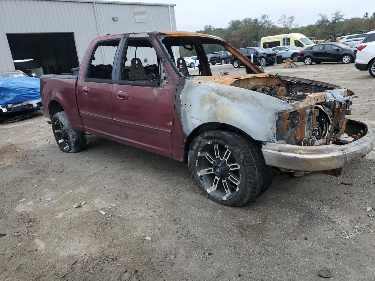 2003 Ford F-150 VIN 1FTRW07663KA14817 Copart auction photo, burn damage thumbnail 4