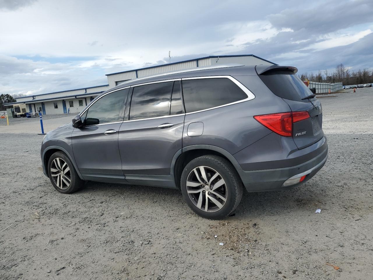 2016 Honda Pilot VIN 5FNYF5H9XGB001654 Copart auction photo, side / rear end damage thumbnail 2