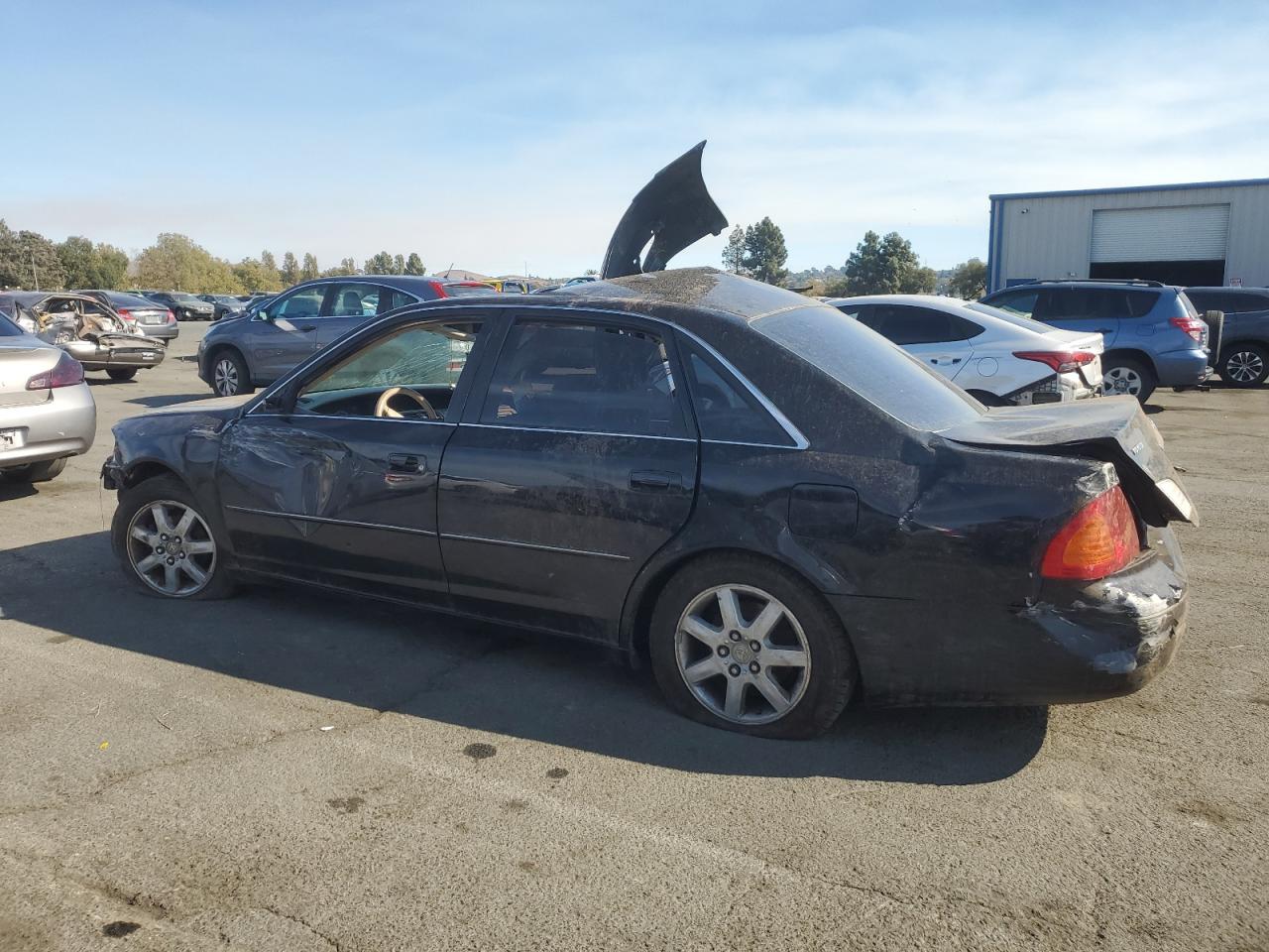 2000 Toyota Avalon VIN 4T1BF28B9YU079791 Copart auction photo, all over damage thumbnail 2