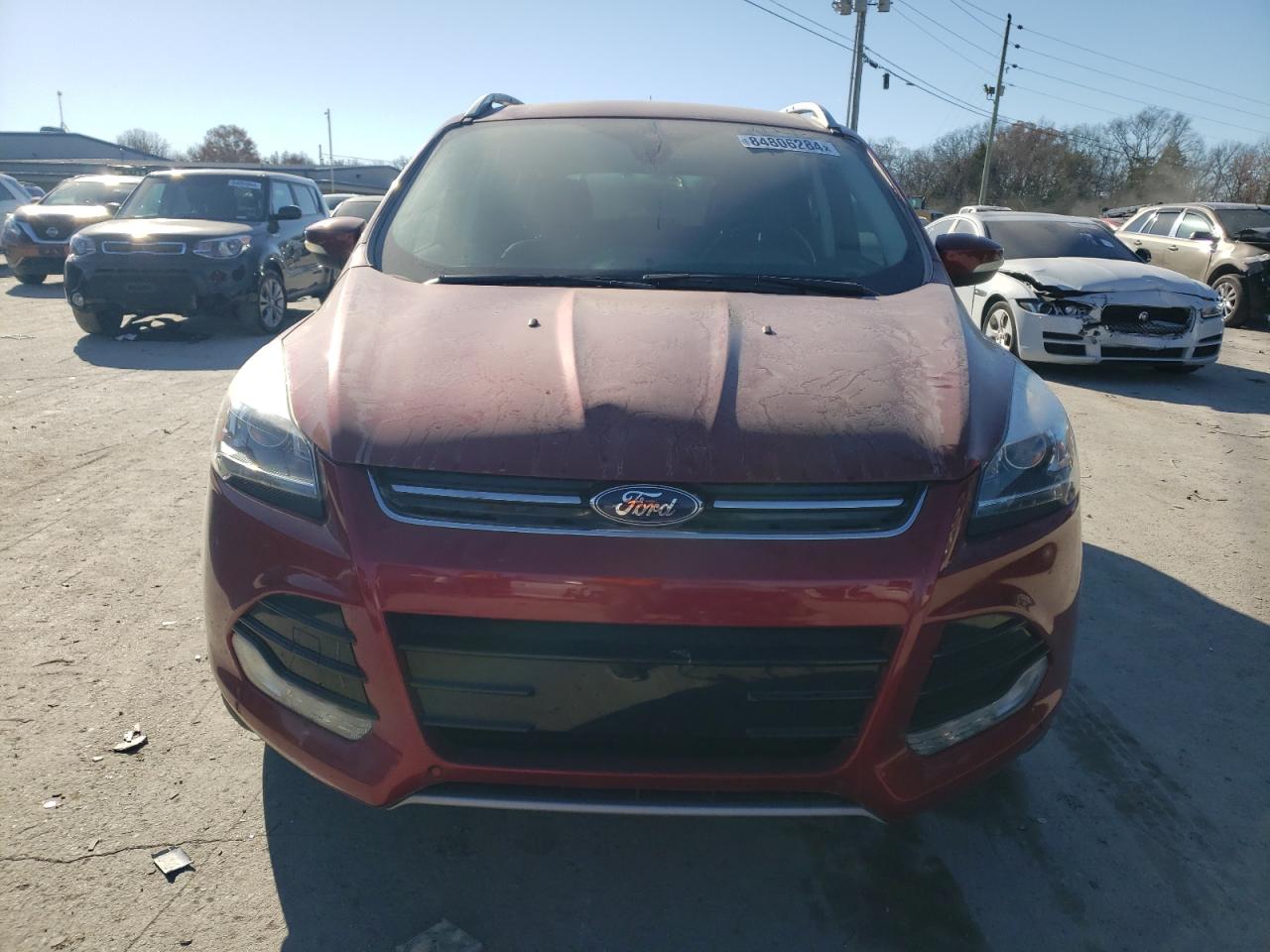2016 Ford Escape VIN 1FMCU0JX9GUA83147 Copart auction photo, all over damage thumbnail 5