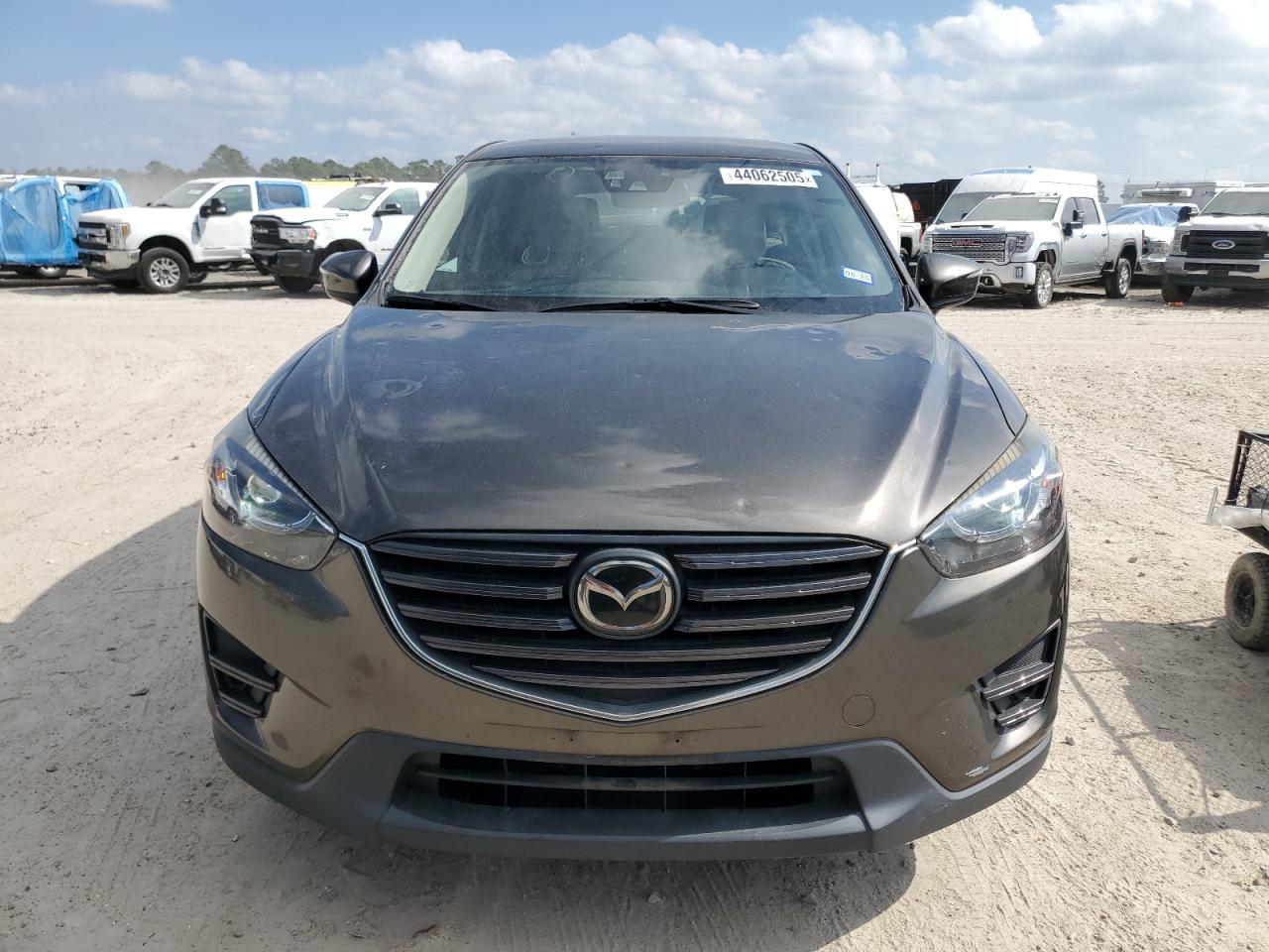 2016 Mazda CX-5 VIN JM3KE2DY1G0842045 Copart auction photo, hail damage thumbnail 5
