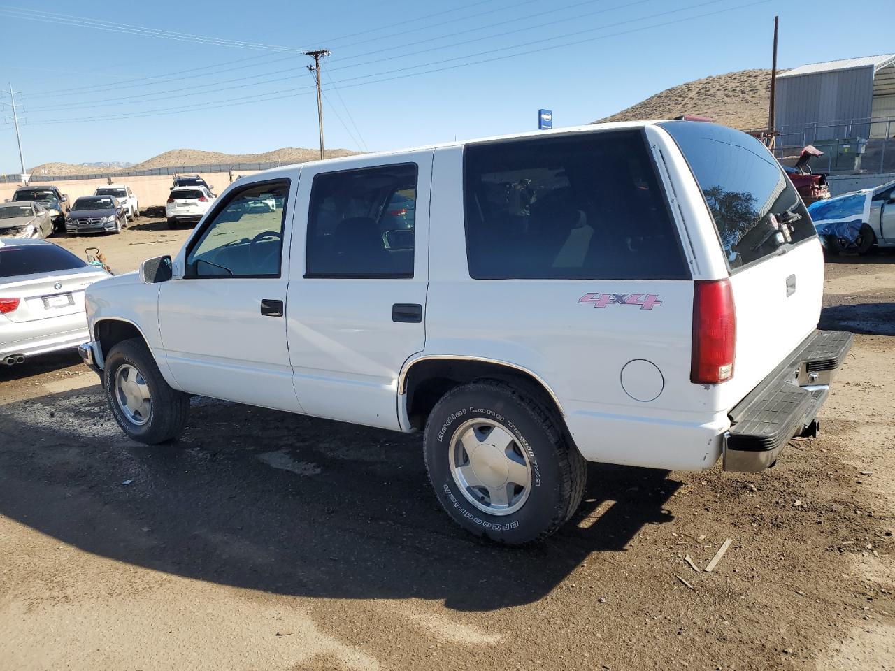 1997 Chevrolet Tahoe VIN 1GNEK13R2VJ325435 Copart auction photo, vandalism / minor dent/scratches damage thumbnail 2