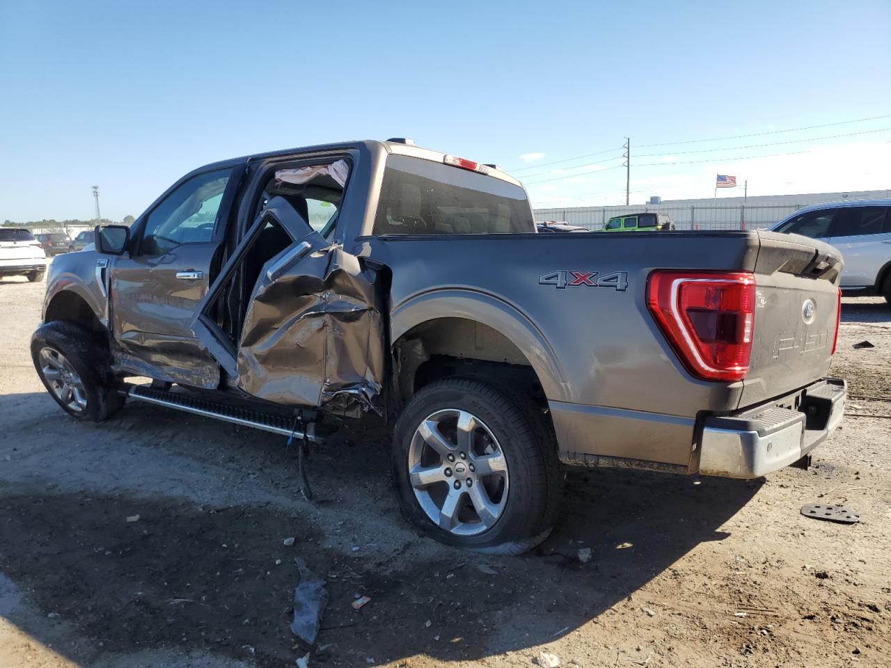 2023 Ford F-150 VIN 1FTFW1E5XPFD28858 Copart auction photo, side / front end damage thumbnail 2